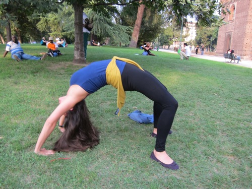 Lindsay doing the wheel yoga pose in Europe