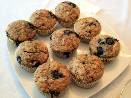 plate of dozen blueberry muffns
