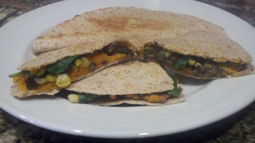vegan sweet potato quesadillas on a white plate