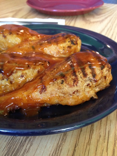 vegan chicken wings topped with BBQ sauce