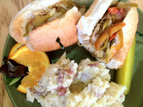 bell pepper and vegan chicken in a bun